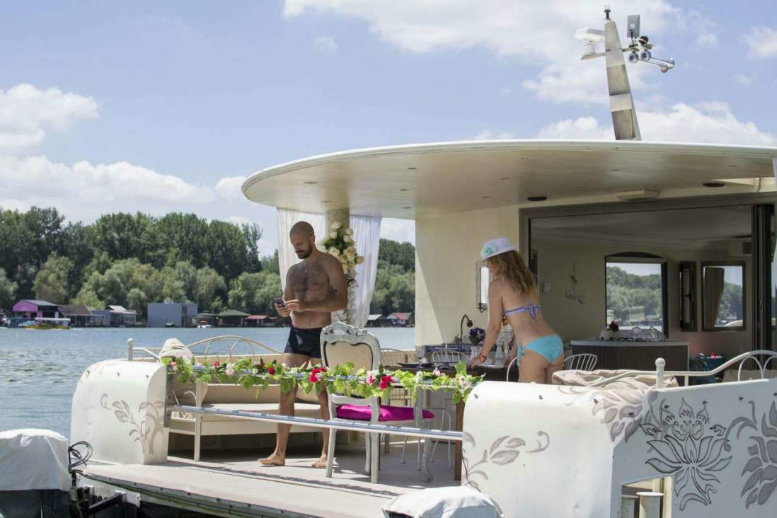 Guys enjoying bachelor party on the boat in Belgrade